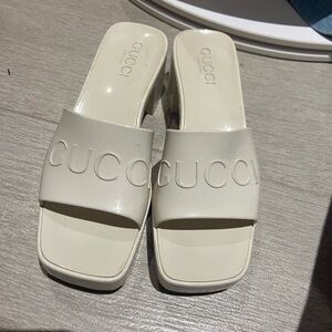 White Gucci rubber slides/heels